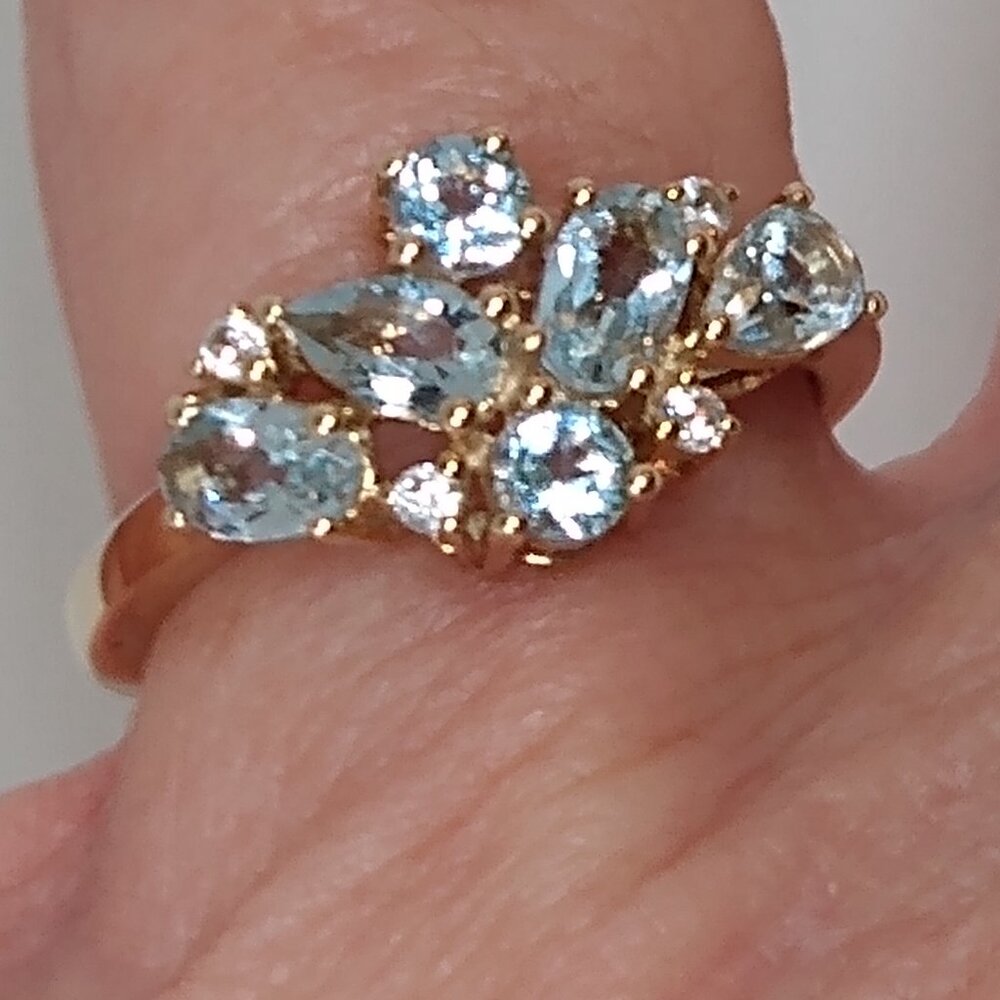 Solid 10k yellow gold ,blue topaz